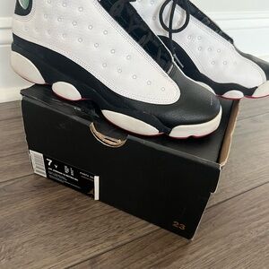 Black and White Sneakers with Red Accents